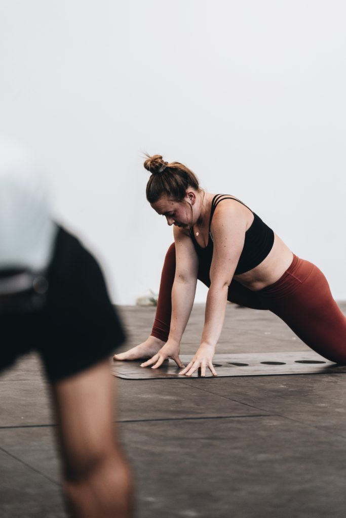 woman stretching hip