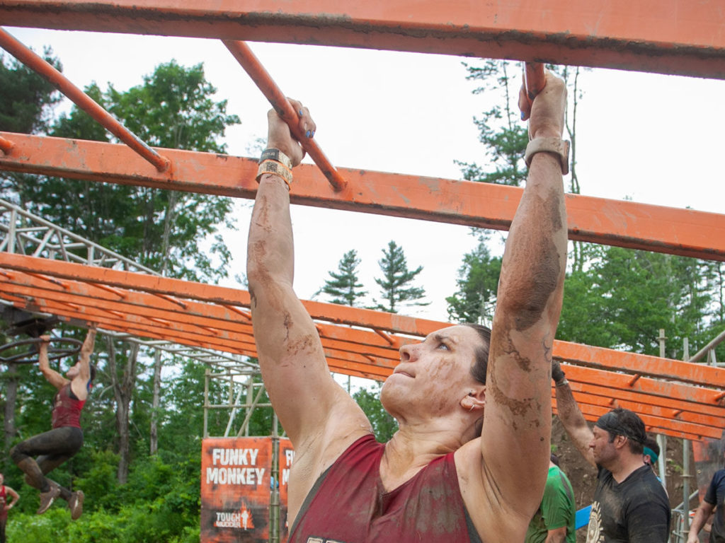 woman monkey bars