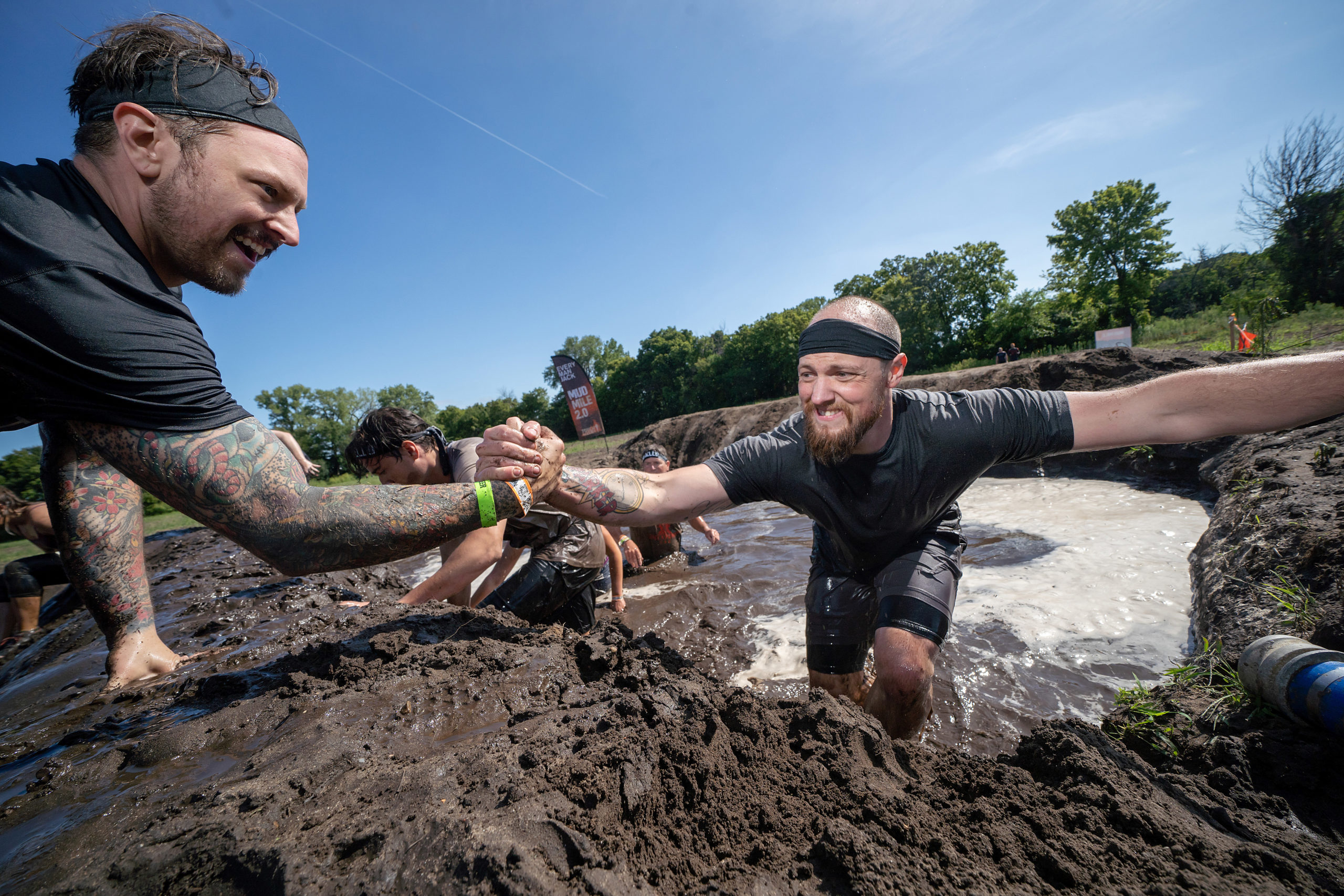 Participant offering his hand for his teammate