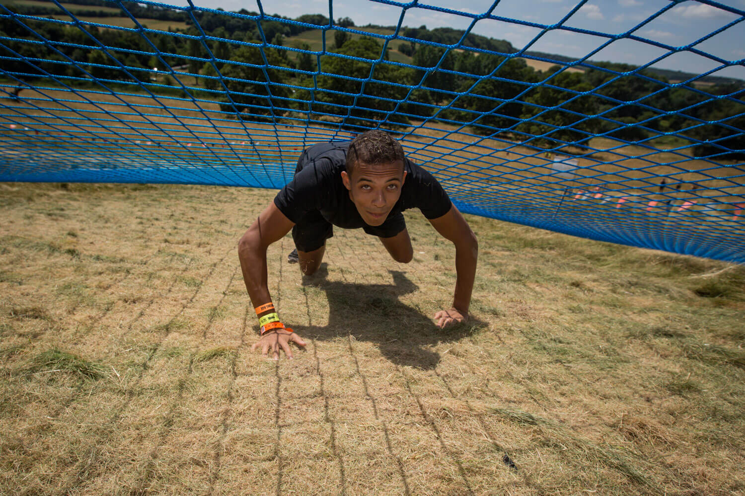 Man crawling under the net
