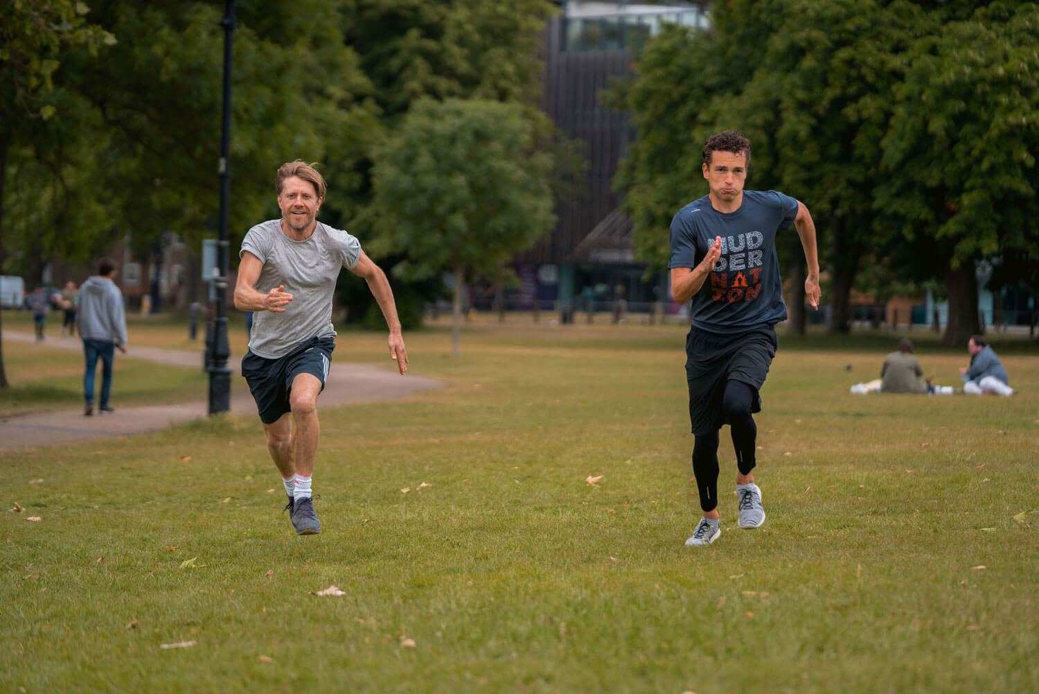 Two people running in the park