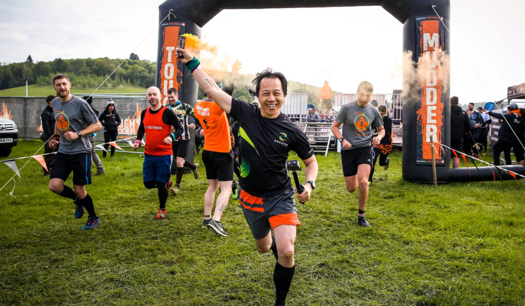 running through Tough Mudder start