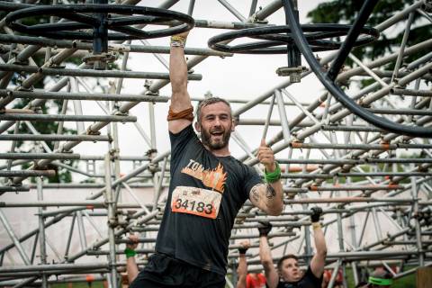 man grip strength hang from obstacle