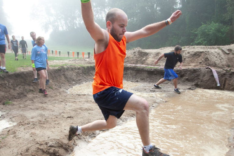 man jumping into water