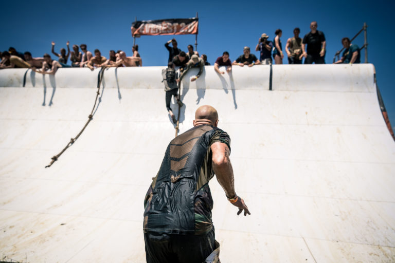 person running up everest obstacle