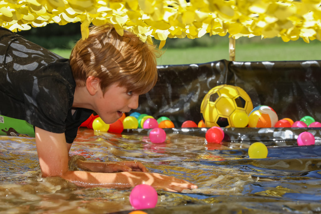 kid head first water obstacle