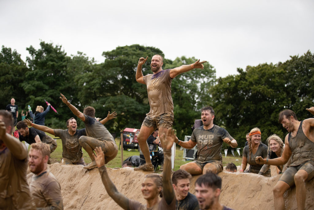 people on mud mile