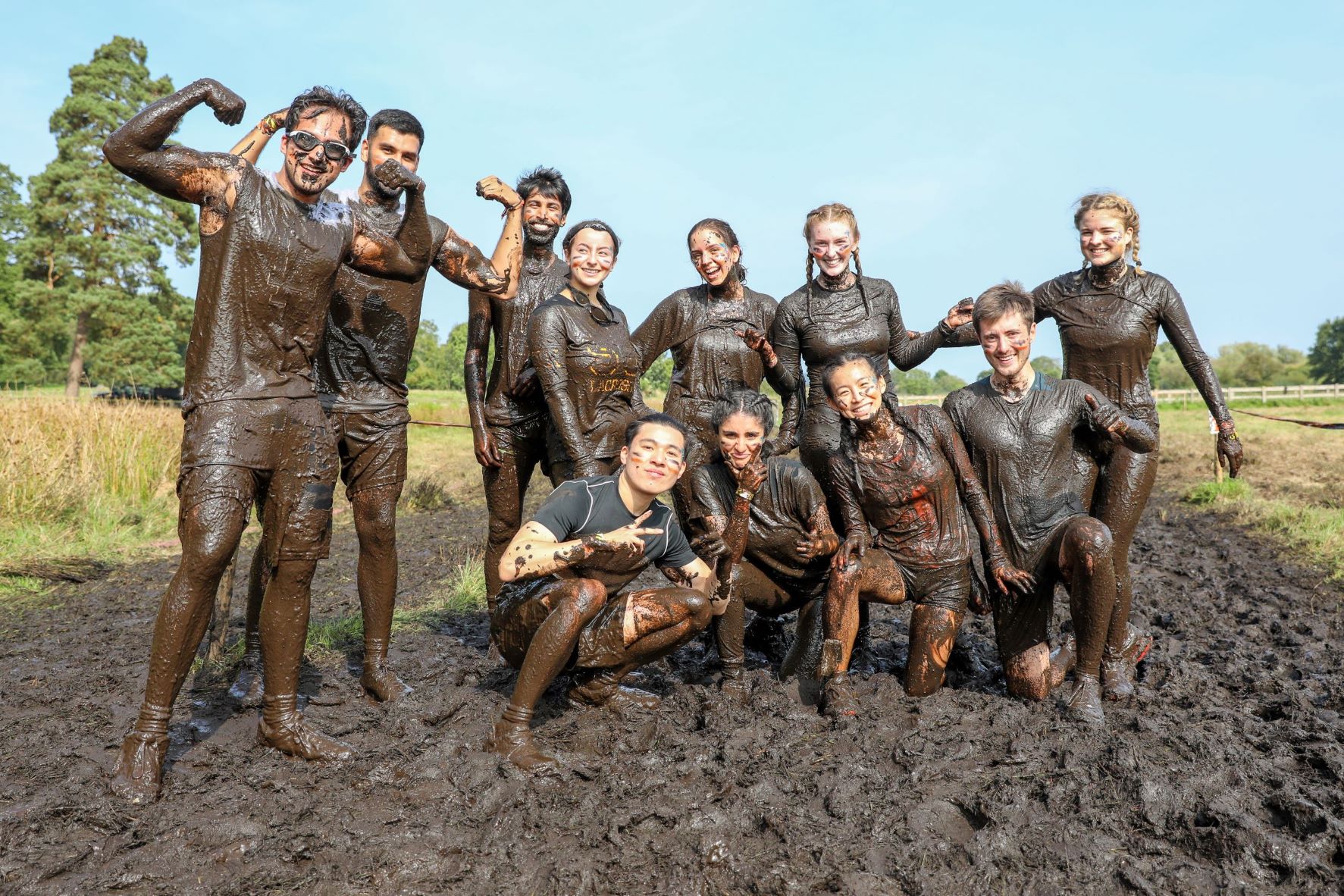 A big team in mud at Tough Mudder North West