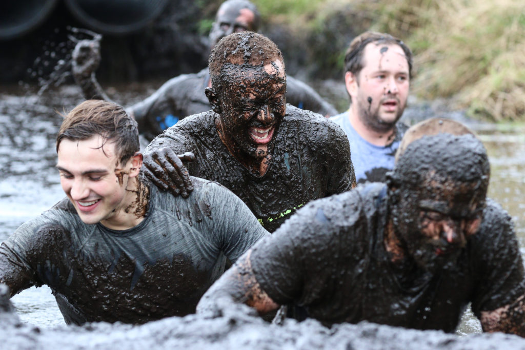 muddy people