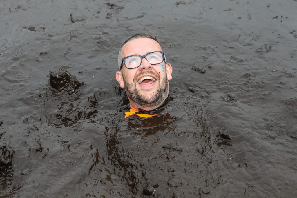 man in mud