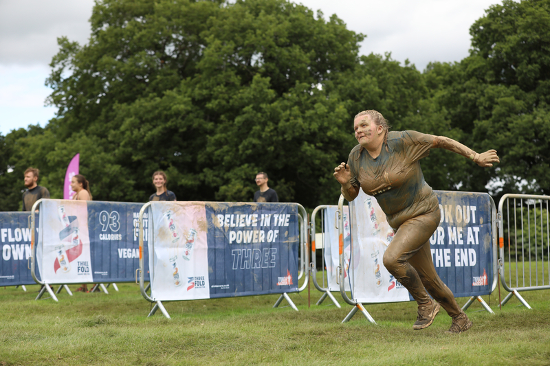 woman running towards obstacle