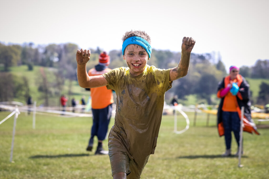 boy running Lidl Mudder kids course 