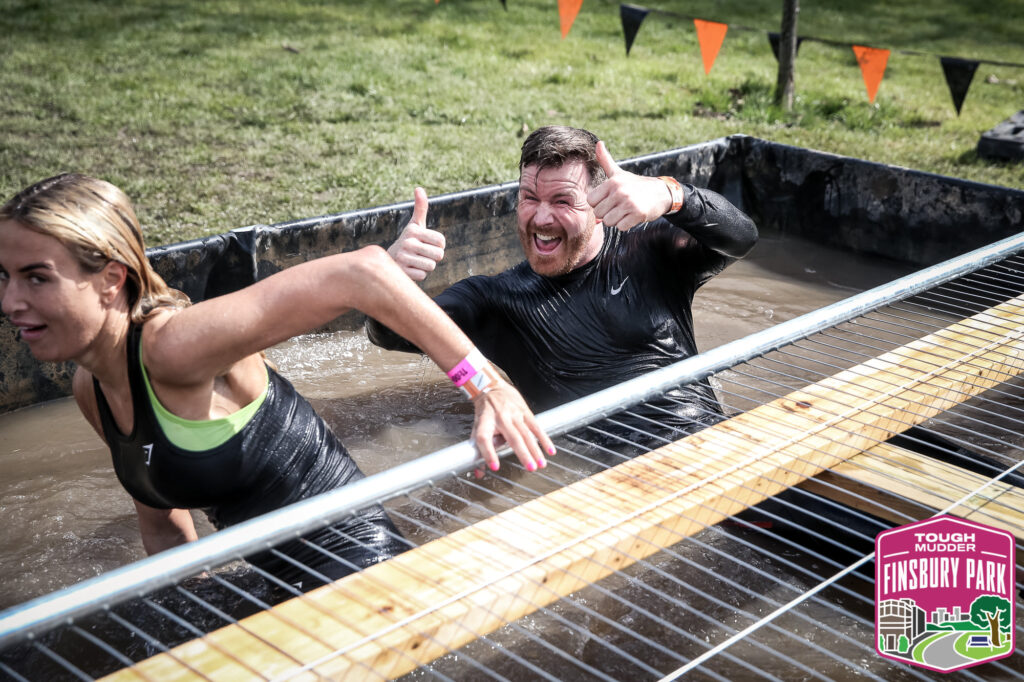 water obstacle man thumbs up