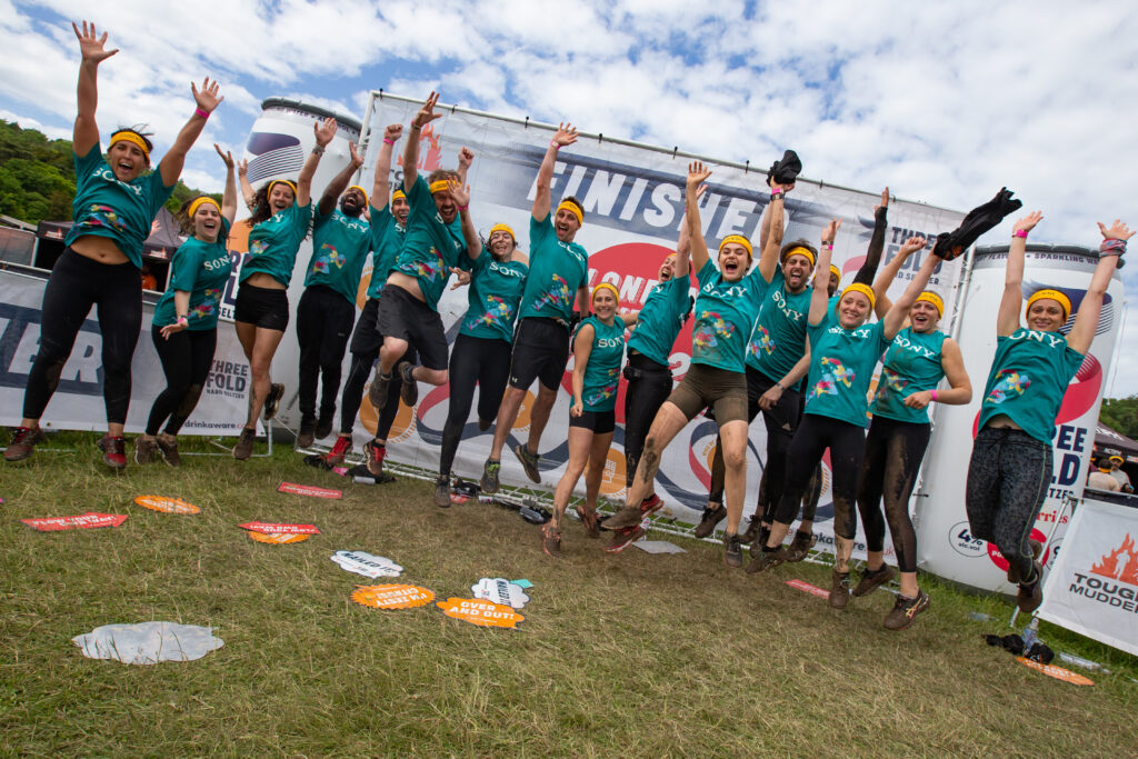 team jumping at London West Tough Mudder