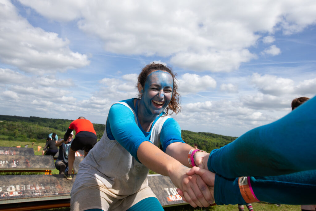 girl in fancy dress on obstacle