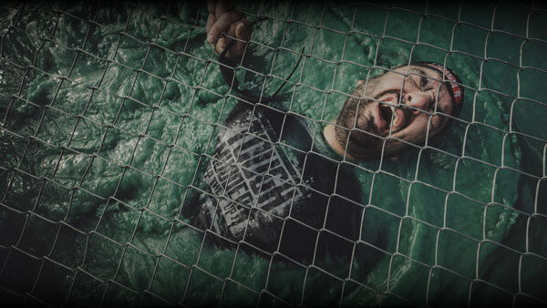 A participant struggling to float on Cage Crawl