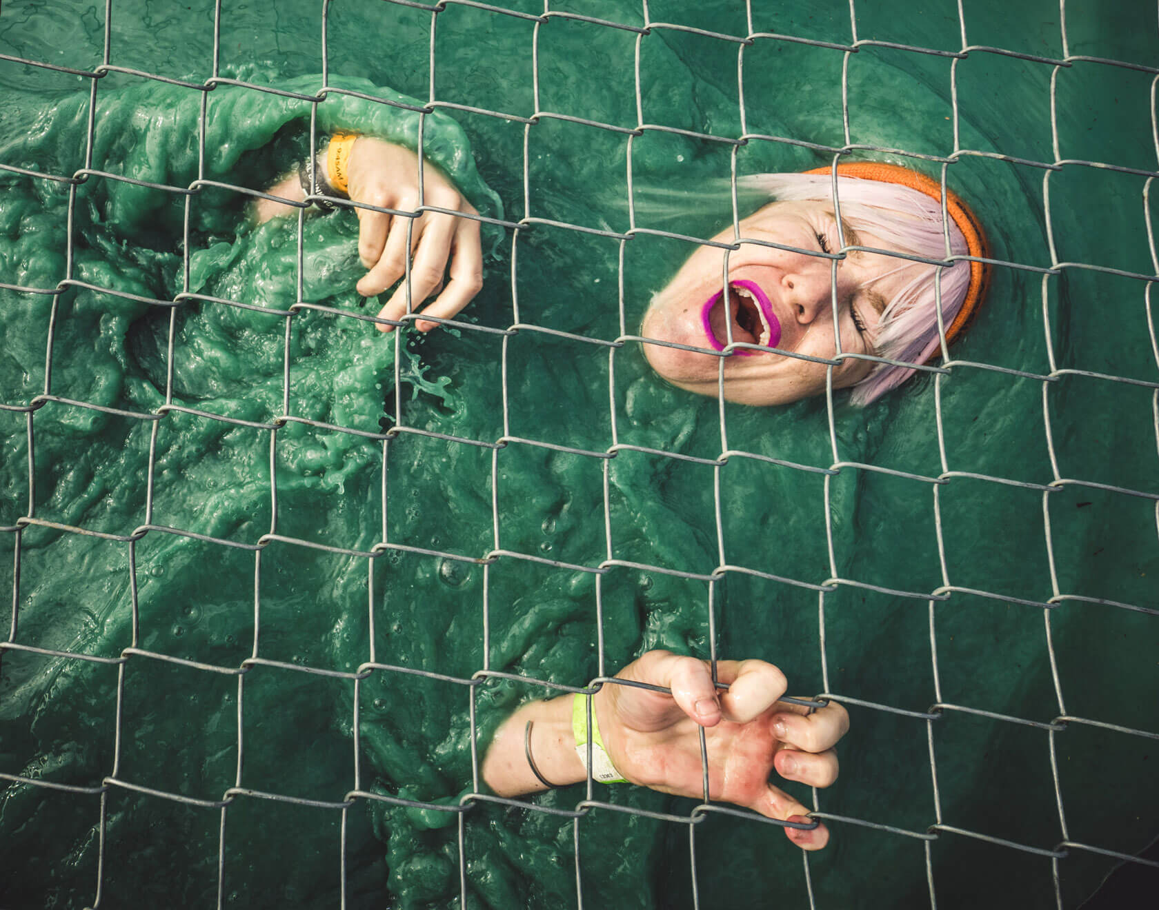 A participant screaming as she goes through Cage Crawl