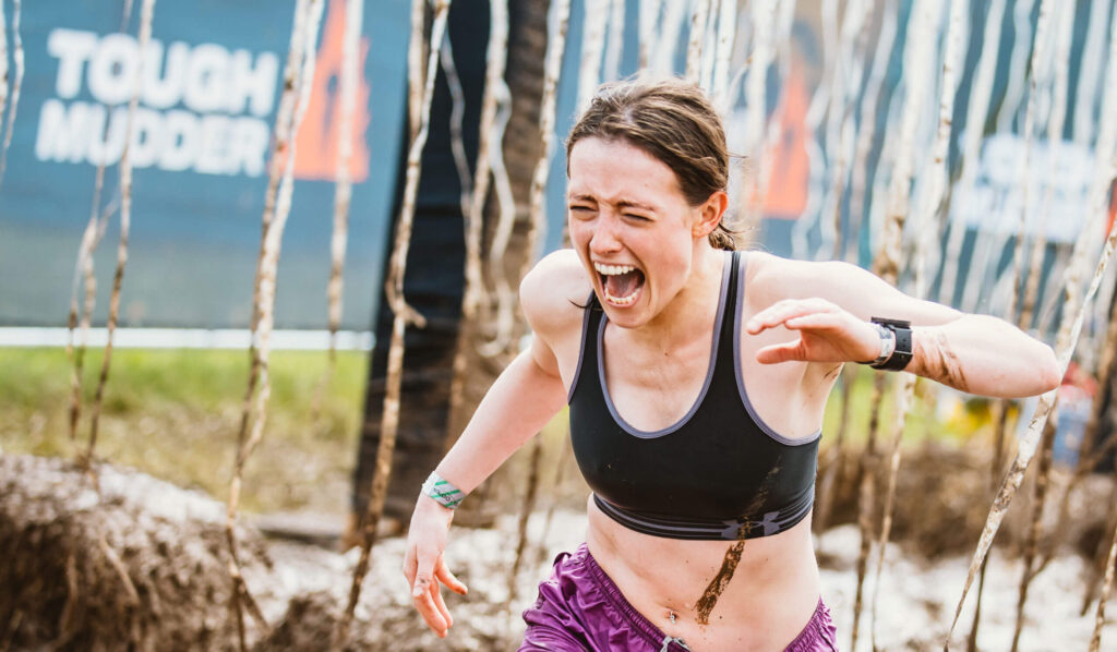 A participant screaming while running through the Electroshock Therapy